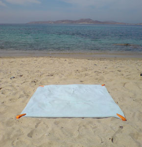 The Beach Towel Clip on a beach The Beach Towel Clip on a beach